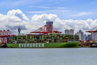 Contenedores de Evergreen. La OCDE apunta a una fuerte recuperación en pospandemia.  (Photo by ISHARA S. KODIKARA / AFP)