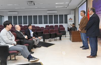 Representantes de Kotra junto a directivos del PTI-Py.