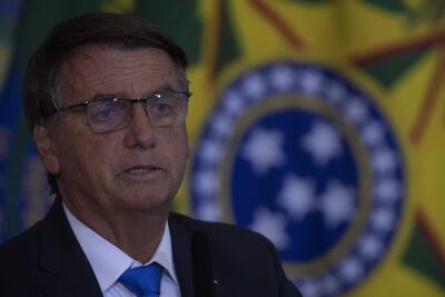 l presidente de Brasil, Jair Bolsonaro, participa en el lanzamiento del certificado de Crédito para el Reciclaje+ y el Plan Nacional de Residuos Sólidos, en el Palacio de Planalto, en Brasilia (Brasil) el 13 de abril de 2022.