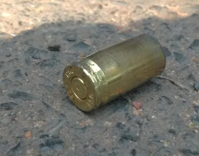 Bala percutida durante el asalto.