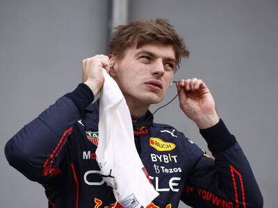 Red Bull Racing's Dutch driver Max Verstappen reacts after winning pole position for the Sprint race during the qualifying session at the Autodromo Internazionale Enzo e Dino Ferrari race track in Imola, Italy, on April 22, 2022, ahead of the Formula One Emilia Romagna Grand Prix. (Photo by GUGLIELMO MANGIAPANE / various sources / AFP)