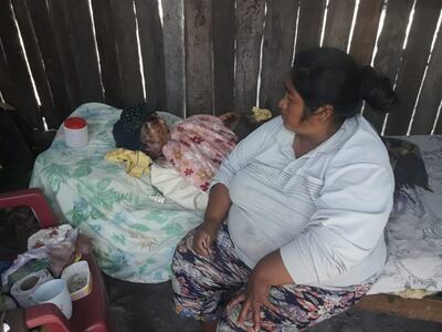 Doña Gervacia Chamorro, postrada en su cama.