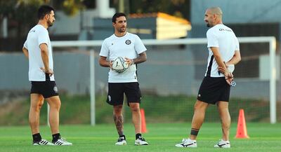 Julio César Cáceres y los uruguayos Juan Manuel Salgueiro y Sergio Orteman, parte del cuerpo técnico de Olimpia.
