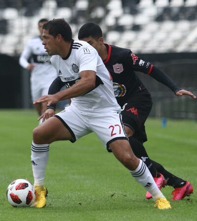 El olimpista José Leguizamón en el amistoso ante el Santo.