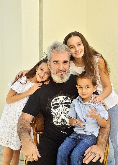 Carlo “Cana” Borghetti con sus hijos Lina, Giulia y Franco.