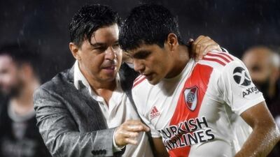 Marcelo Gallardo (i)y Robert Rojas (d).