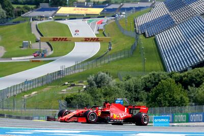 Ferrari's German driver Sebastian Vettel steers his car during the qualifying round at the Austrian Formula One Grand Prix on July 4, 2020 in Spielberg, Austria. - Seven months after they last competed in earnest, the Formula One circus will push a post-lockdown re-set button to open the 2020 season in Austria on July 5. (Photo by Darko Bandic / POOL / AFP)
