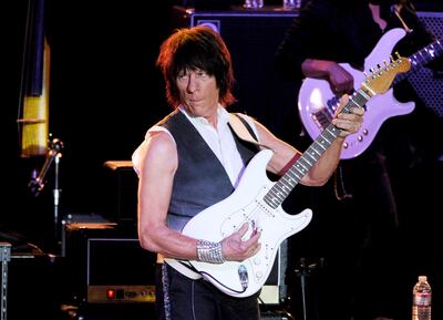 (FILES) This file photo taken on October 20, 2013 shows British guitarist Jeff Beck performing at the Greek Theatre in Los Angeles, California. - Beck died on January 11, 2023 at the age of 78, according to his official website. (Photo by KEVIN WINTER / GETTY IMAGES NORTH AMERICA / AFP)