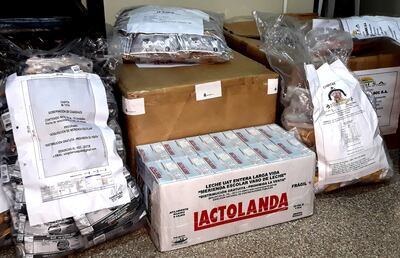 Una caja de leche presentada como muestra por el único oferente para la provisión del producto para la merienda escolar en Caaguazú.