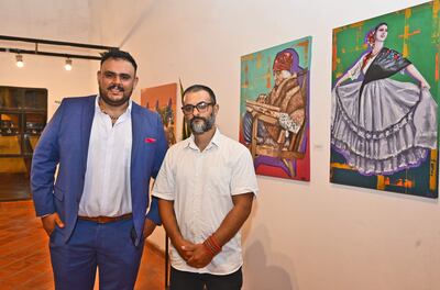 El artista José Portillo y Luis Feijoo.