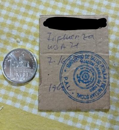 "Certificado" de cartón en comparación con el tamaño de una moneda de G. 1.000.