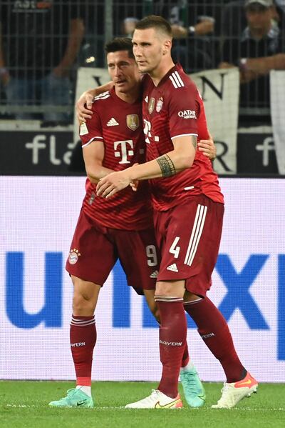 Robert Lewandowski (izq.), principal figura ofensiva del Bayern Múnich.