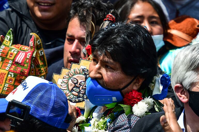 Bolivia's former president Evo Morales is seen in Villazon in southern Bolivia, on November 9, 2020 after arriving back in his country from Argentina, where he had sought refuge after first fleeing to Mexico. - Leftist former president Evo Morales crossed the border from Argentina into Bolivia on Monday, ending a year-long exile that followed a failed bid for a controversial fourth term. (Photo by Ronaldo SCHEMIDT / AFP)