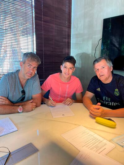 Juan Miguel Ojeda, con Regis Marques y su padre Juan Carlos.