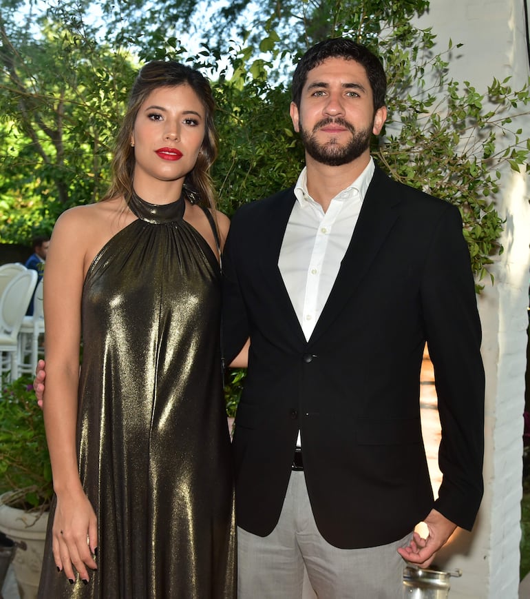 Pilar Cáceres y Nando Rivarola.