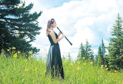 Con el oboe para arriba.