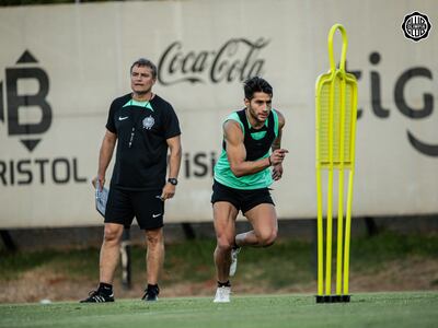 Diego Aguirre, entrenador de Olimpia, e Iván Torres.