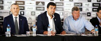 Balotta (i) fue tesorero durante la gestión de Trovato (c).