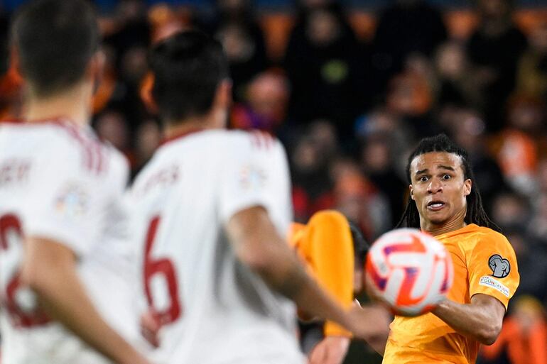 Netherlands' defender Nathan Ake reacts during the UEFA Euro 2024 group B qualification football match between Netherlands and Gibraltar at the Stadion Feijenoord 'De Kuip', in Rotterdam, on March 27, 2023. (Photo by JOHN THYS / AFP)