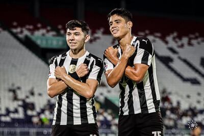 Julio César Enciso (17 años) y Lorenzo Melgarejo (31 años), jugador revelación y goleador respectivamente de Libertad.
