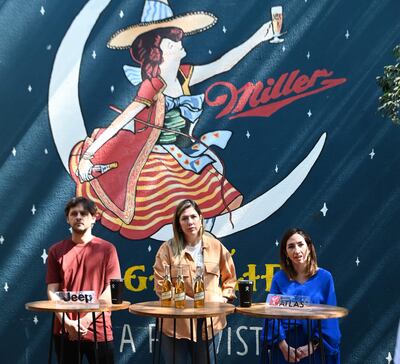 Juan Carlos Guerrero, de Paru Familia; Betania Barreto, brand manager de Miller y Cinzia Rosini, gerente de Marketing de Banco Atlas.