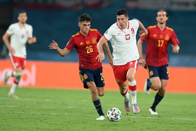 Lewandowski (c) hizo el gol del empate ante España.