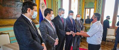 Entrega de títulos de tierra en la Presidencia de la República, el 13 de octubre del 2020, que incluyó los de la Colonia 8 de Diciembre.