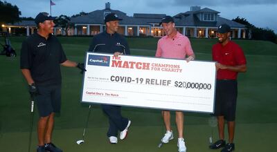 Foto para Getty Images: Tiger Woods y Peyton Manning (d) y Phil Mickelson y Tom Brady.