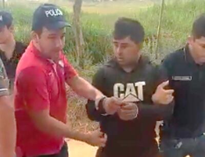 Rafael Bruno Rolón (medio), quien es sindicado de ser uno de los principales sospechosos de asesinar a, Francisco Villalba Cuba (52),