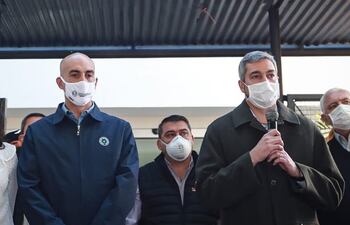 Julio Mazzoleni y Mario Abdo Benítez.