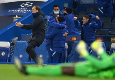 TOPSHOT - Chelsea's German head coach Thomas Tuchel celebrates after Chelsea's English midfielder Mason Mount (unseen) scored his team's second goal during the UEFA Champions League second leg semi-final football match between Chelsea and Real Madrid at Stamford Bridge in London on May 5, 2021. (Photo by Glyn KIRK / AFP)