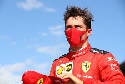 Ferrari's Monegasque driver Charles Leclerc puts on his hat after placing second the Austrian Formula One Grand Prix race on July 5, 2020 in Spielberg, Austria. (Photo by Mark Thompson / POOL / AFP)