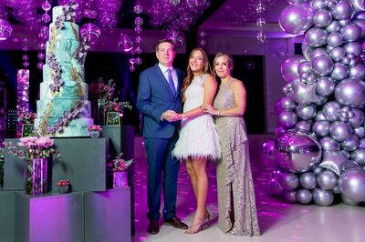 Eugenia con sus padres.