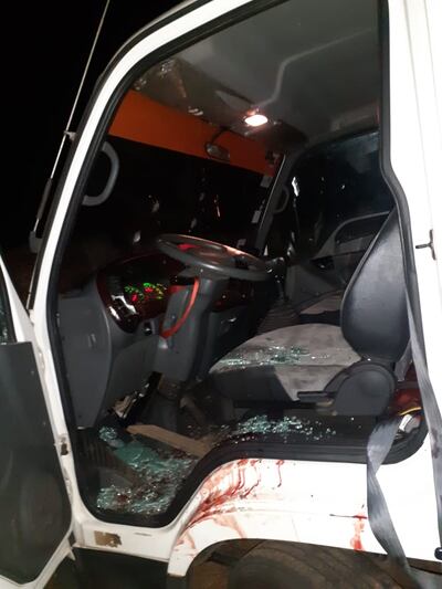 El conductor fue baleado durante el atraco.