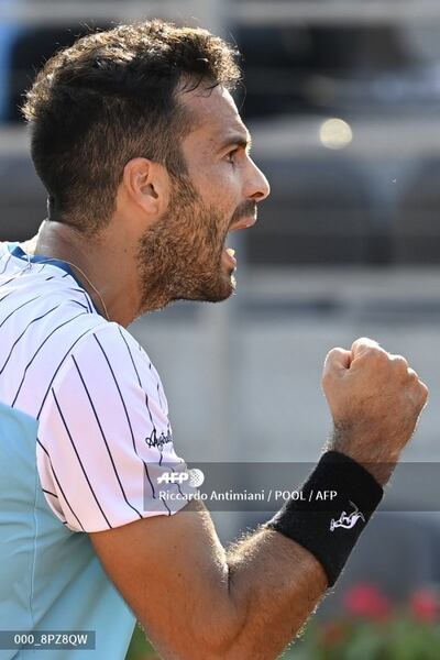 Salvatore Caruso celebra un punto en el partido ante Tennys Sandgren.