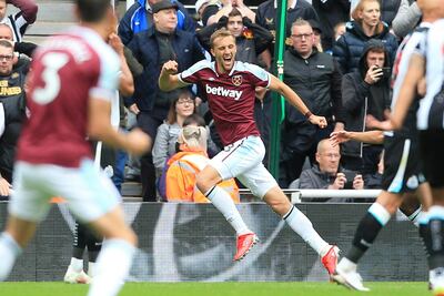 West Ham United's Czech midfielder Tomas Soucek celebrates scoring their third goal during the English Premier League football match between Newcastle United and West Ham United at St James' Park in Newcastle-upon-Tyne, north east England on August 15, 2021. (Photo by Lindsey Parnaby / AFP) / RESTRICTED TO EDITORIAL USE. No use with unauthorized audio, video, data, fixture lists, club/league logos or 'live' services. Online in-match use limited to 120 images. An additional 40 images may be used in extra time. No video emulation. Social media in-match use limited to 120 images. An additional 40 images may be used in extra time. No use in betting publications, games or single club/league/player publications. /