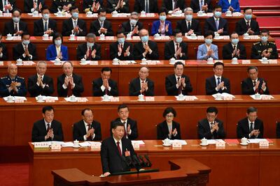El presidente de China, Xi Jinping (al frente) durante la sesión anual del Congreso chino. (AFP)