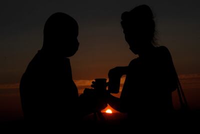 Puesta de sol desde la Plaza de la Armería del Palacio Real de Madrid, antes del concierto que ofreció la cantante israelí Noa incluido en la programación del "Jazz Palacio Real 2021".