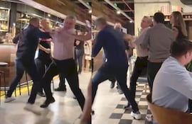 A los golpes. Villamayor se enfrenta con uno de sus escrachadores en el restaurante.