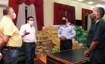 El gobernador de Paraguarí, Juan Carlos Baruja (de blanco), se reunió con autoridades sanitarias, policiales y militares.