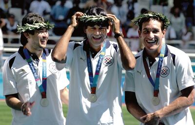 Julio Enciso, José Cardozo y Carlos Gamarra posan orgullosos con sus medallas de plata.