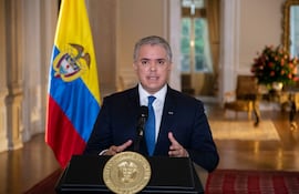 Fotografía cedida por la Presidencia de Colombia que muestra al mandatario Iván Duque, mientras ofrece un discurso.