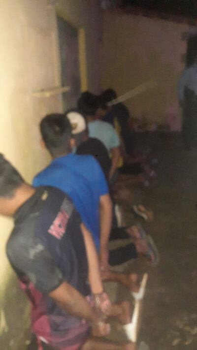 Fotografía proporcionada por la Policía Nacional, de los detenidos en el procedimiento de despeje de una calle en MRA.