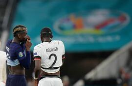 Pogba y Rüdiger, tras el partido.