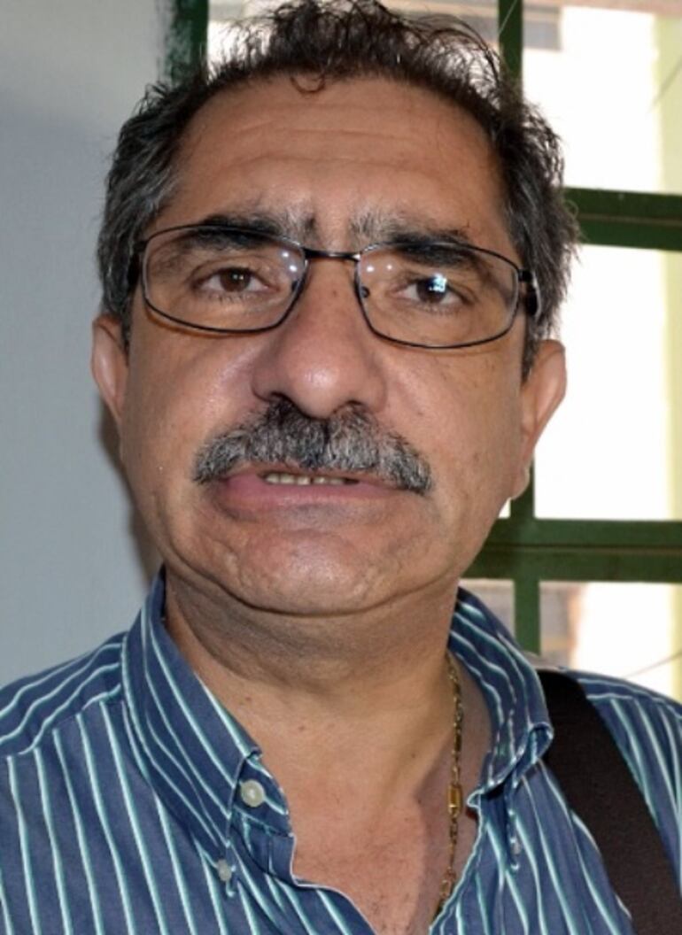 Aurio Frighetto, productor.