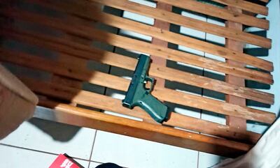La pistola Glock usada en los crímenes.