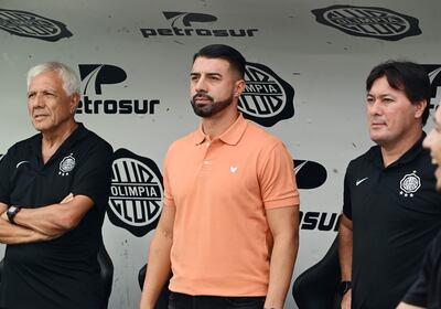 Elvio Paolorosso (izq.), Julio César Cáceres y Francisco Esteche.