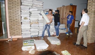 Parte de las bolsas de billetes venezolanos encontrados en la vivienda de los Da Costa Amaral.