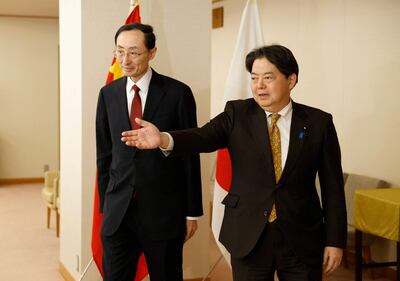 (FILES) This file photo taken on February 22, 2023 shows China's Vice Minister of Foreign Affairs Sun Weidong (L) attending a meeting with Japan's Foreign Minister Yoshimasa Hayashi (R) at the Foreign Ministry in Tokyo. - Japan's top diplomat Yoshimasa Hayashi will visit China from April 1, the first such visit in over three years, the foreign ministry in Tokyo announced on March 31, 2023. (Photo by ISSEI KATO / POOL / AFP)