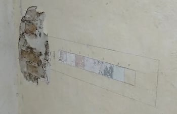 En la imagen se observa las siete capas de colores que fueron descubiertas en las paredes del Palacio de López.